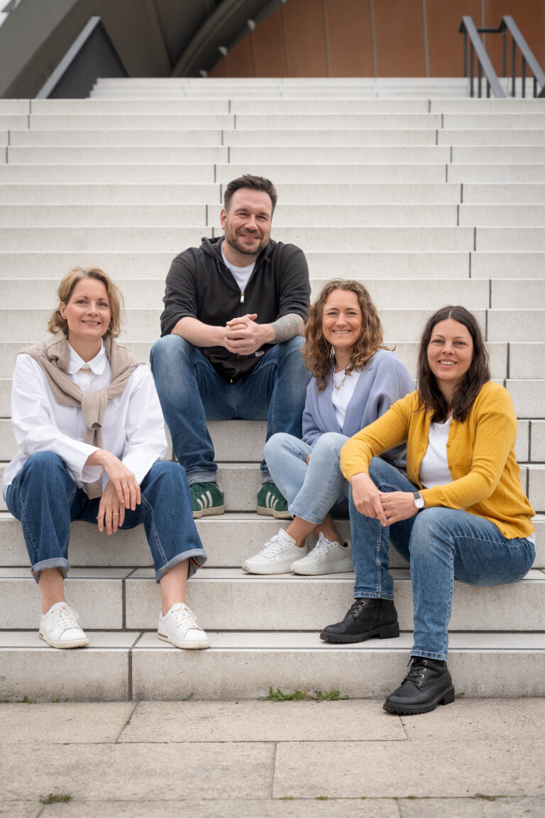 Die vier Coaches von Coaching⁴ im Gruppenfoto